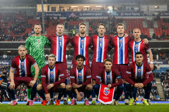 The starting eleven of Norway pose for a team photo