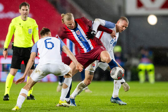 Erling Braut Haaland of Norway and Ondrej Duda of Slovakia