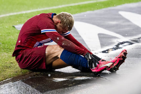 Julian Ryerson of Norway in pain