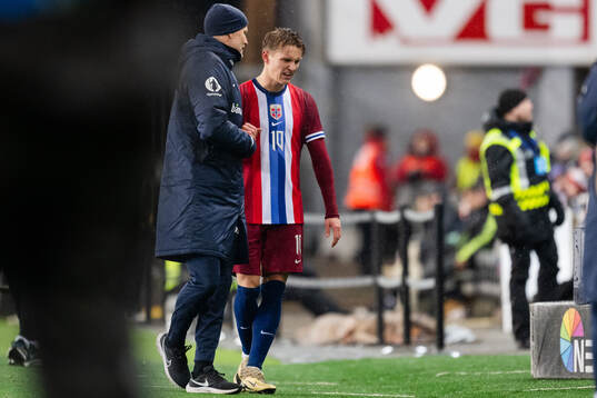 Head coach Ståle Solbakken and Martin Ødegaard of Norway