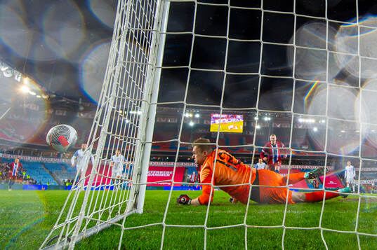 Goalkeeper Marek Rodak of Slovakia saves a penalty kick