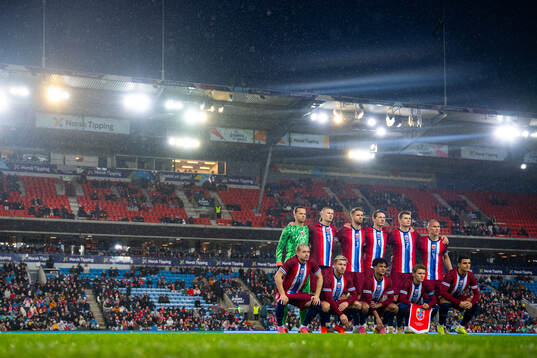 The starting eleven of Norway pose for a team photo