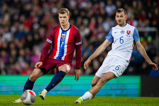 Alexander Sørloth of Norway and Norbert Gyömber of