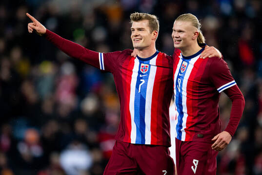 Alexander Sørloth of Norway celebrates with teammate