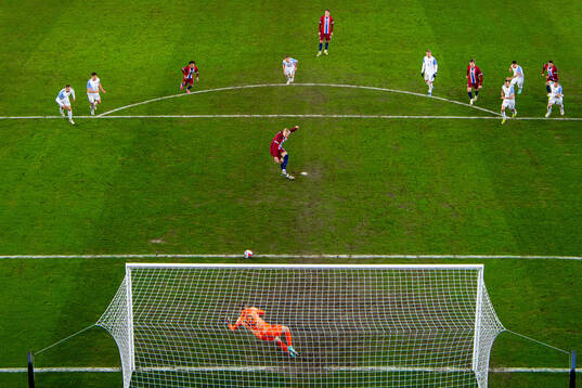 Goalkeeper Marek Rodak of Slovakia saves a penalty kick