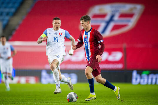 Juraj Kucka of Slovakia and David Møller Wolfe of Norway
