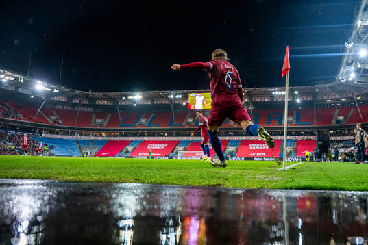 Patrick Berg of Norway takes a corner kick
