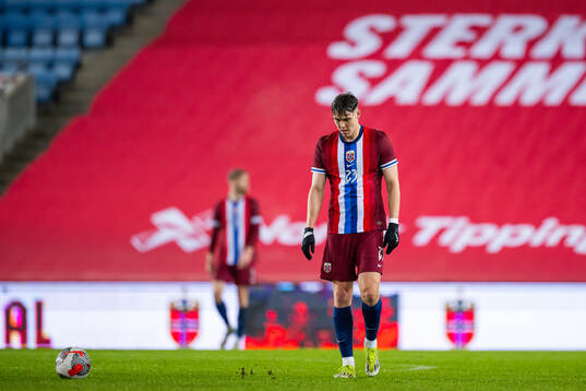 Jørgen Strand Larsen of Norway looks dejected