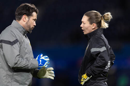 Goalkeeper coach Mattias Gustafsson and goalkeeper Jennifer