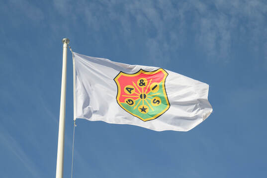 En flagga med GAIS klubbmärke