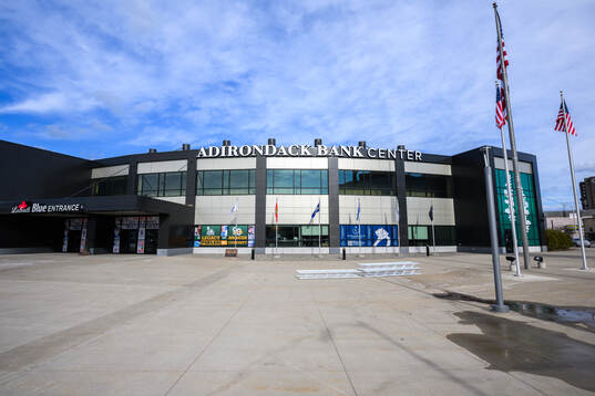 Exterior view of Adirondack Bank Center at a team photo