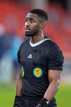 Domare Fredrik Oppong