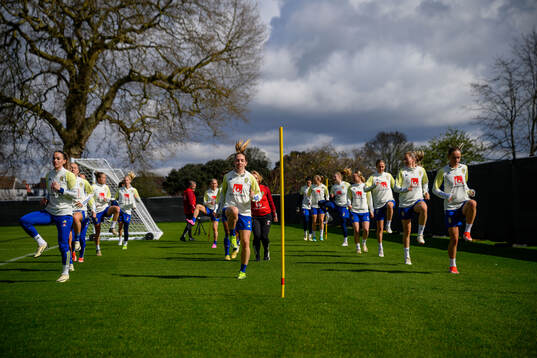 Players of the Swedish women's national football team warm