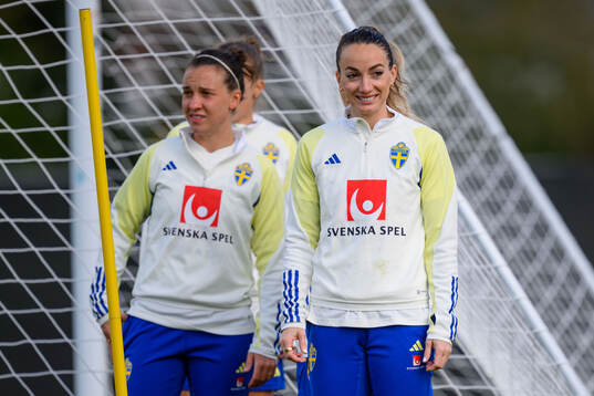Julia Zigiotti Olme and Kosovare Asllani of Sweden of the