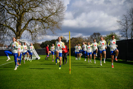 Players of the Swedish women's national football team warm