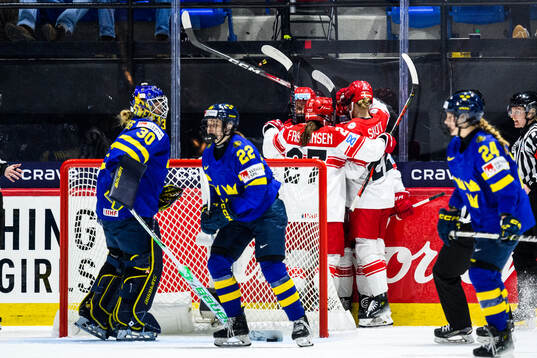 Nicoline Jensen of Denmark celebrates with teammates