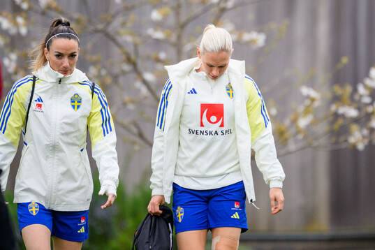 Kosovare Asllani and Jonna Andersson of Sweden of the