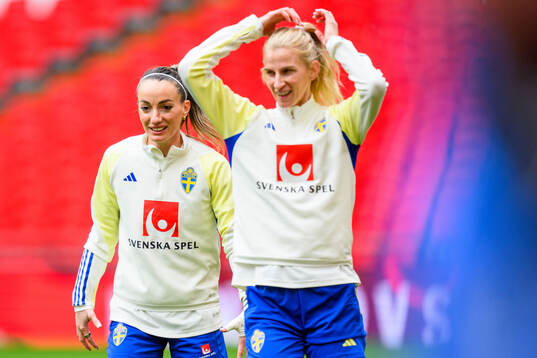 Kosovare Asllani and Sofia Jakobsson of Sweden of the