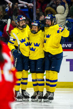 Sofie Lundin of Sweden celebrates with teammates