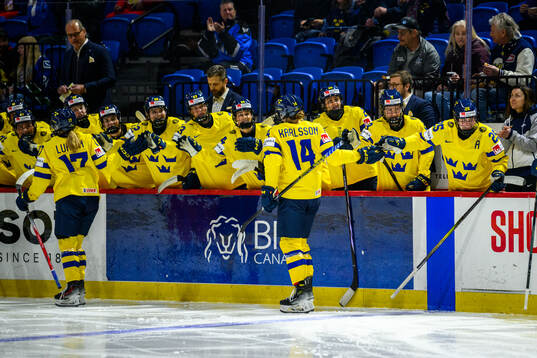 Sofie Lundin of Sweden celebrates with teammates