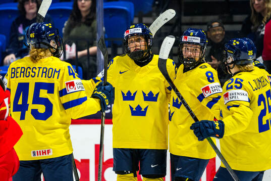 Hanna Olsson of Sweden celebrates with teammates