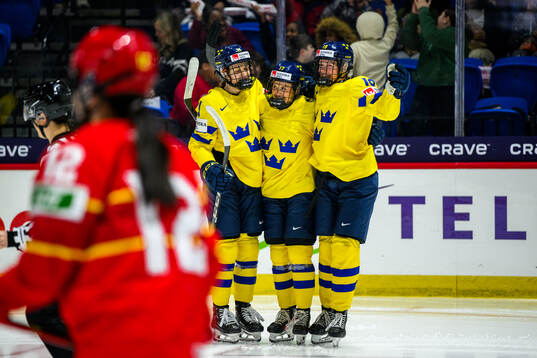 Sofie Lundin of Sweden celebrates with teammates