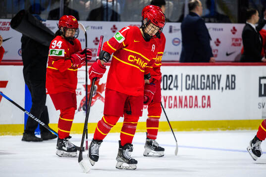 Mengying Zhang of China looks dejected