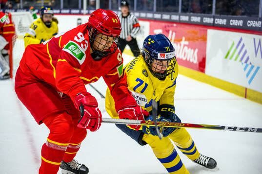 Zhixin Liu of China and Anna Kjellbin of Sweden