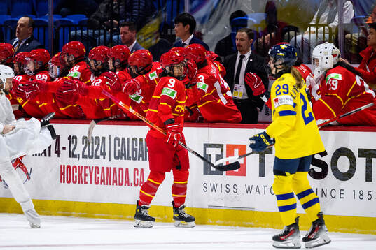 Minghui Kong of China celebrates scoring 7-1