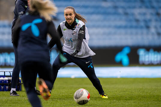 Guro Reiten of Norway warms up
