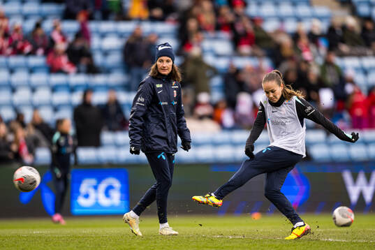 Guro Reiten of Norway warms up