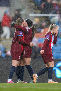 Elisabeth Terland and Tuva Hansen of Norway celebrate