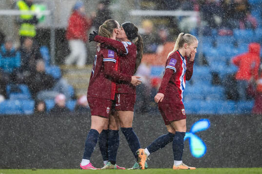Elisabeth Terland and Tuva Hansen of Norway celebrate