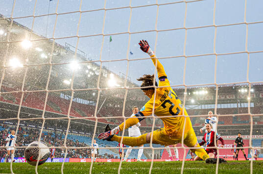 Elisabeth Terland of Norway scores the 4-0 goal