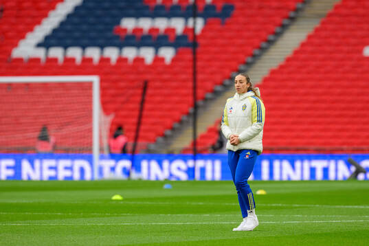 Rusul Rosa Kafaji of Sweden walks the pitch