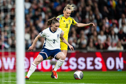 Niamh Charles of England and Stina Blackstenius of Sweden