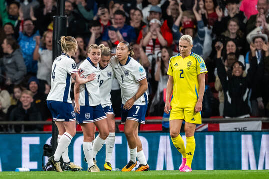 Alessia Russo of England celebrates with team mates