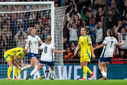 Alessia Russo of England celebrates with team mates