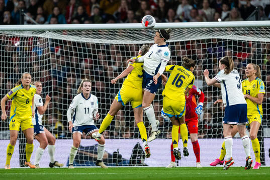 Linda Sembrant of Sweden and Lucy Bronze of England