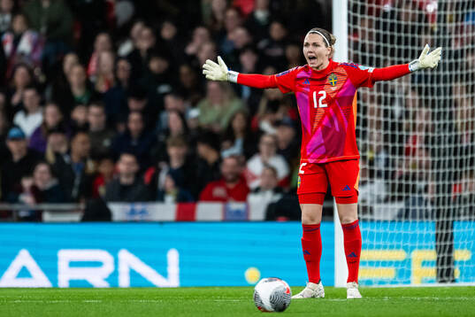 Goalkeeper Jennifer Falk of Sweden reacts