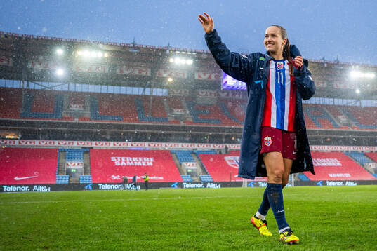 Guro Reiten of Norway celebrates