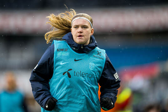 Signe Gaupset of Norway warms up