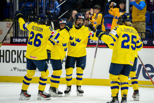 Hilda Svensson of Sweden celebrates with teammates