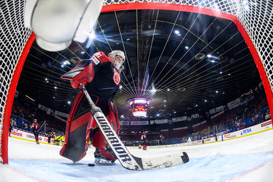 Goaltender Riko Kawaguchi of Japan looks dejected