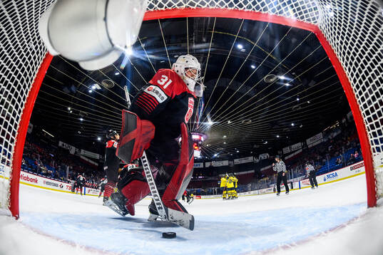 goaltender Riko Kawaguchi of Japan looks dejected