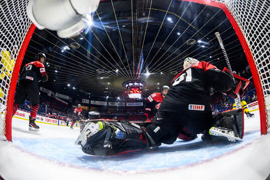 Sara Hjalmarsson (not in picture) of Sweden scores 5-1