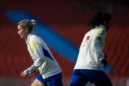 Amanda Nildén and goalkeeper Zecira Musovic of the Swedish