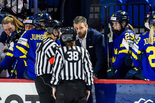 Head coach Ulf Lundberg of Sweden in discussion with