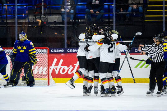 Franziska Feldmeier of Germany celebrates with teammates