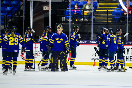 Players of Sweden look dejected